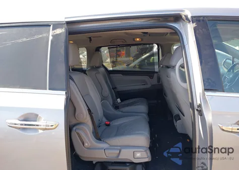 2018 Honda Odyssey Elite z USA, uszkodzony, nr VIN 5FNRL6H91JB070355